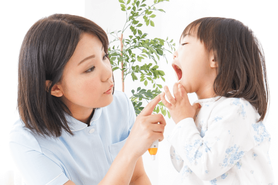 歯科衛生士に歯を見せる